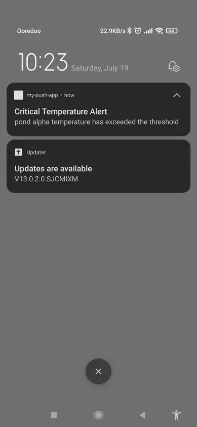 Firmatech critical temperature push notification on an Android lock screen.
